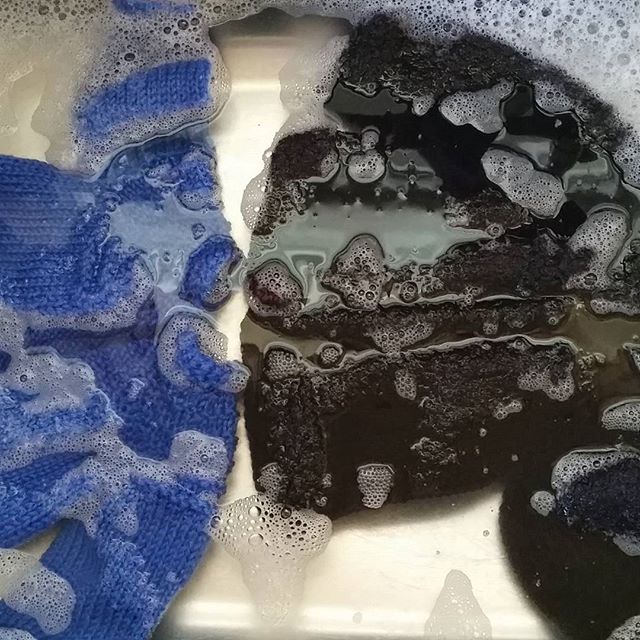 Wee baby sweaters going for a soak.