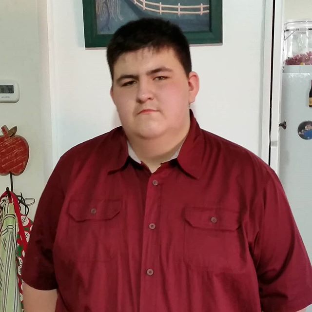 Heading to orientation for his first job. "Don't make me smile, mom"