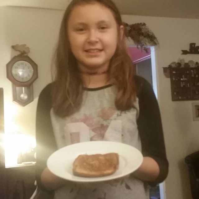 Last kid to learn how to make grilled cheese.