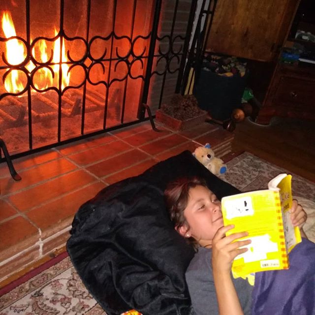 Reading by firelight. #poweroutage