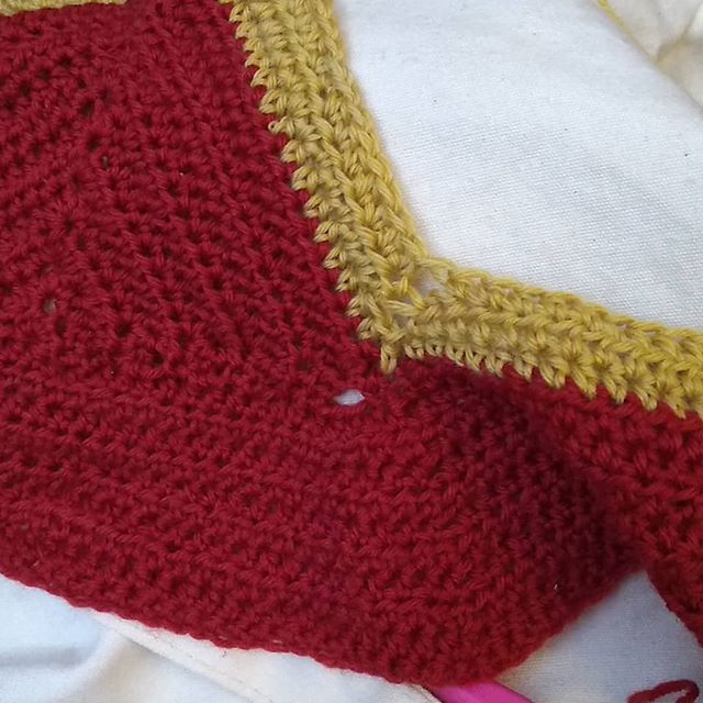 Considering going down a hook size or two because the fabric is so be loose. Crocheters, will it help with these holes too?